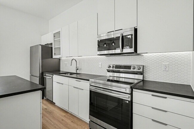 Building Photo - Be the first to live in Unit 203 at 2217 Fitzhugh—a brand-new 2026 construction offering 628 sq f...