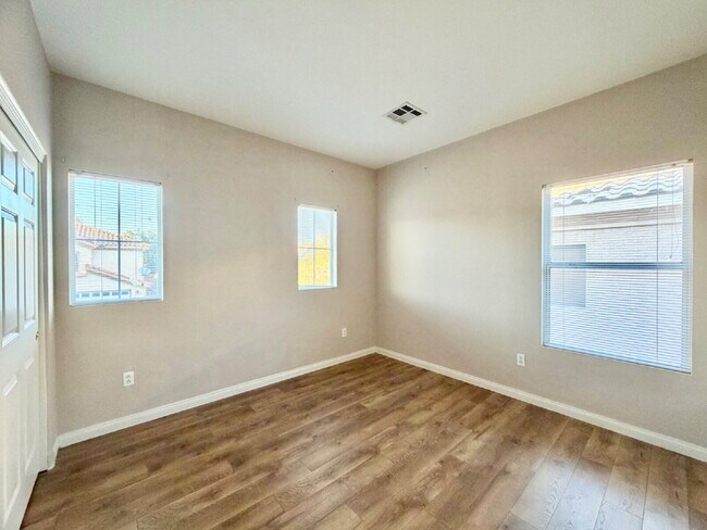 Building Photo - GATED SUMMERLIN HOME | 5 BEDROOM + DOWNSTAIRS DEN | 3-CAR GARAGE