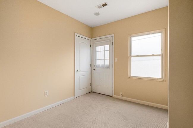 Building Photo - Spacious 2BR/2.5BA Townhome with Finished Basement & Extra Storage