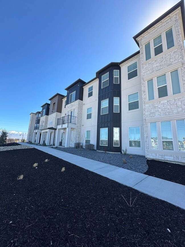 Building Photo - Brand New 3 Bed Condo with Resort-Style Amenities & Included Internet!