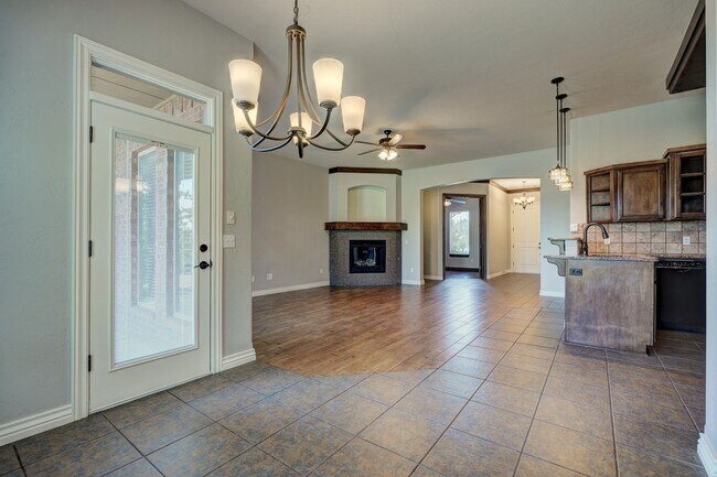 Building Photo - Stunning 3 Bedroom Home with Fireplace, Community Amenities & Open Floor Plan
