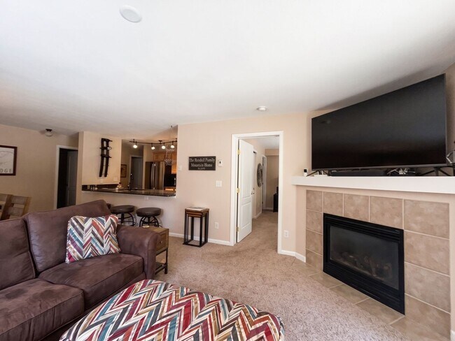 Building Photo - Two-Bedroom Condo with Attached Garage, Available Now