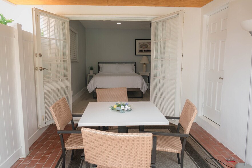 French Doors Open to Covered Patio - 4540 NW 12th Dr