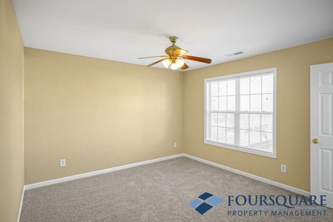 Building Photo - Charming 3-Bedroom Townhome with First-Floor Suite & Off-Street Parking – Near Capital Blvd & I-440