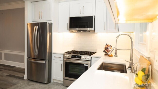 Building Photo - 65 Poe Ave