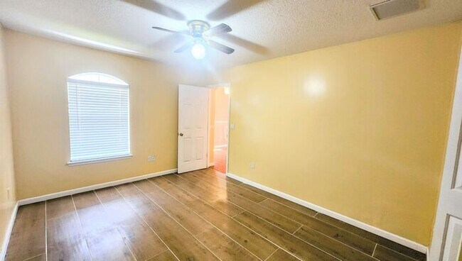 Building Photo - Spacious 4BR w/ Fenced Yard + Covered Lanai + 2 Car Garage  in Orange Park!