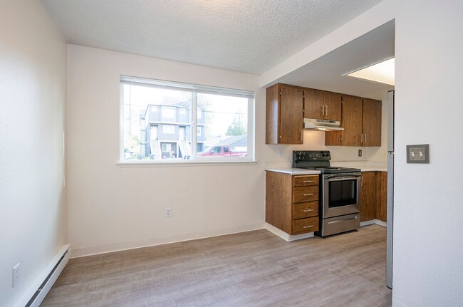 Building Photo - Charming Ground-Level 2-Bedroom Apartment ...