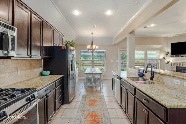 Building Photo - LEGACY HOME AVAILABLE! BELLE ROSE!