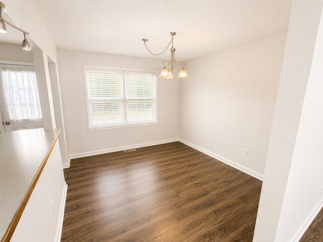 Building Photo - Spacious West Manhattan Home with Modern Updates, Oversized Garage & Prime Location