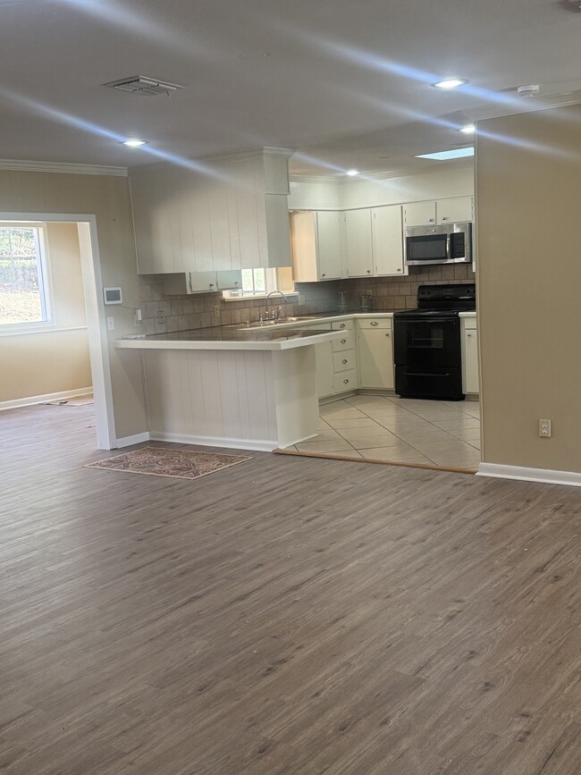 Building Photo - 205 Whispering Pine Dr