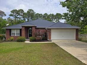 Building Photo - Prime Location in Pace – Dixon School Dist...