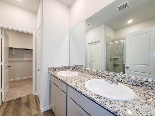 Building Photo - Welcome Home! Your never-lived-in sanctuary awaits your arrival. Have a large household? This 5-b...