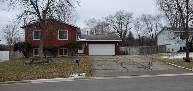 additional parking next to garage - 14619 Burnell Park Dr