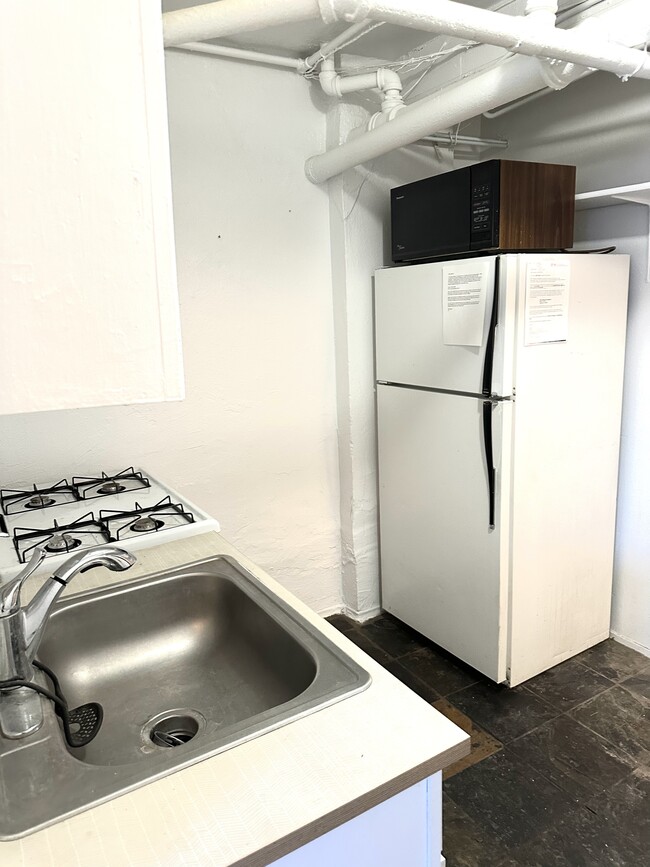 Explore the functionality of this cozy kitchen nook, perfect for modern living. - 1458 N Gaylord St