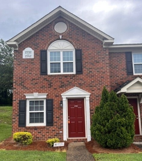 Building Photo - Your New Townhome Awaits at Davis Crossing!
