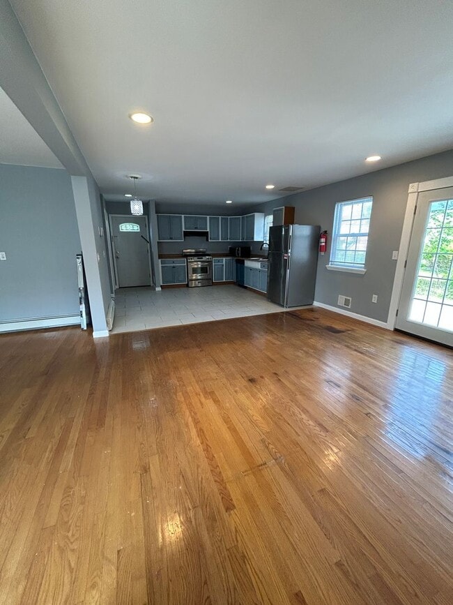 Building Photo - Discover Your Dream Home in Neptune: Spacious 4-Bedroom, 2.5-Bath with Private Backyard and Drive...