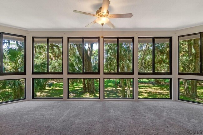 Building Photo - Stunning townhome on Palm Harbor Golf Course!
