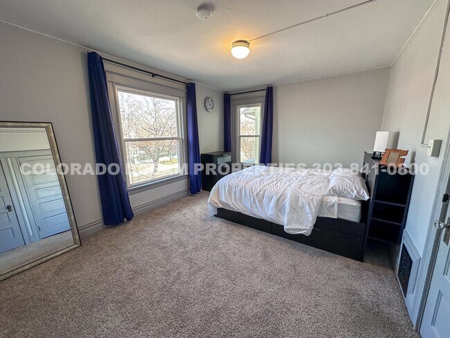 Building Photo - A home where old-world charm meets modern sophistication!