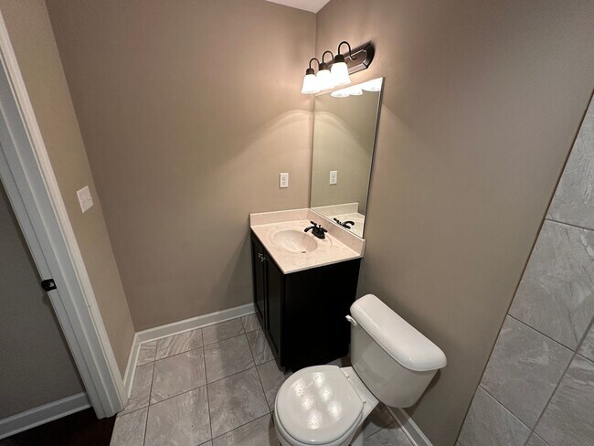 Building Photo - AVAILABLE NOW IN SOUTHAVEN! Spacious 4BR Home with Bonus Room & Fenced Yard