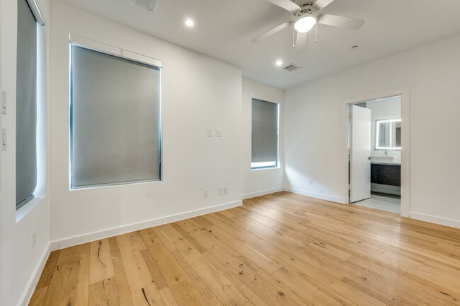 Building Photo - Live Above It All | Sleek Multi-Level Condo with Private Rooftop Deck