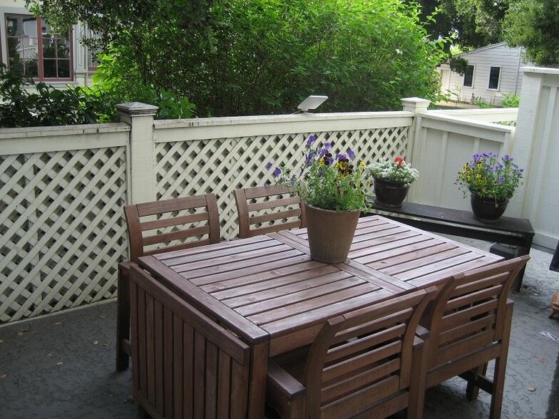 Private patio. Potted plants and outdoor furniture not included. - 655 12th St