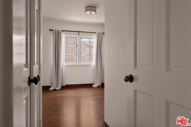 Building Photo - 10707 Wellworth Ave