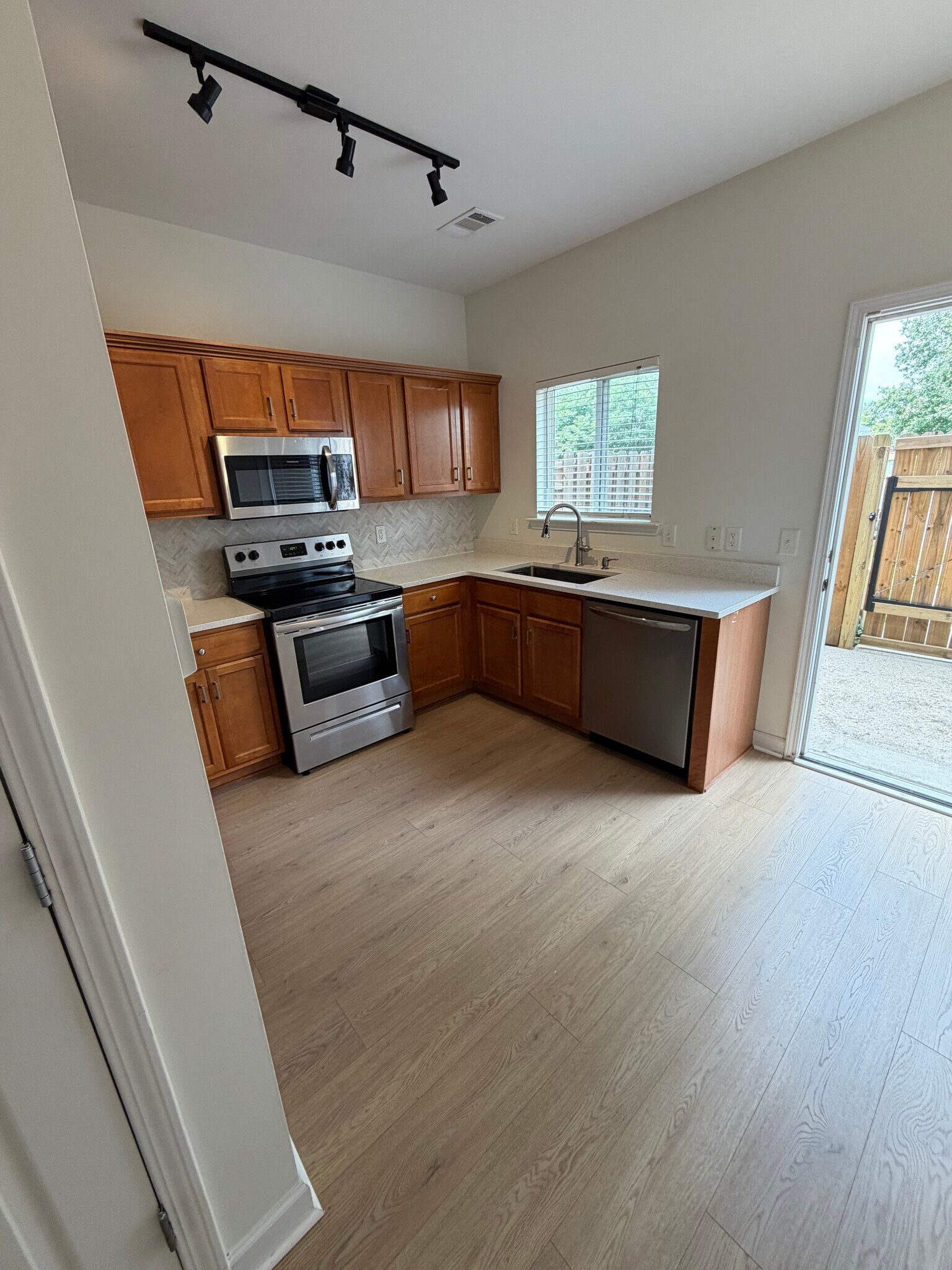 Additional kitchen view along with door to your private patio. - 2017A Beech Ave