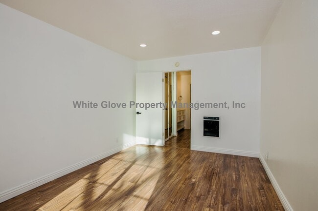 Building Photo - Updated Newport Beach Condo in Gated Versailles Community with Resort-Style Amenities