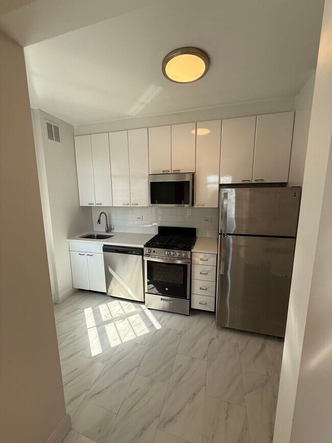 Building Photo - The Leslie — A Private Garden Enclave for the Modern New Yorker