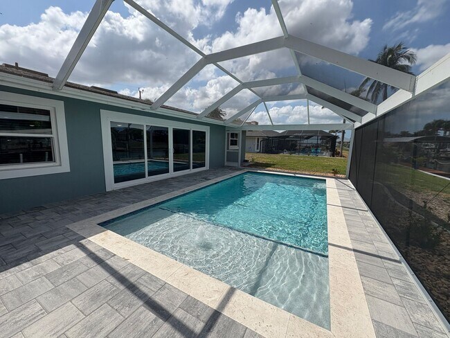 Building Photo - Beautifully Furnished Pool Home with Boat ...
