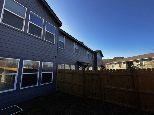 Building Photo - Modern 3BR Townhome w/ Garage, Private Yard & No Carpet – Built 2022