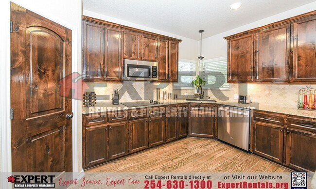 Building Photo - Elegant Corner-Lot Retreat with Upgraded F...