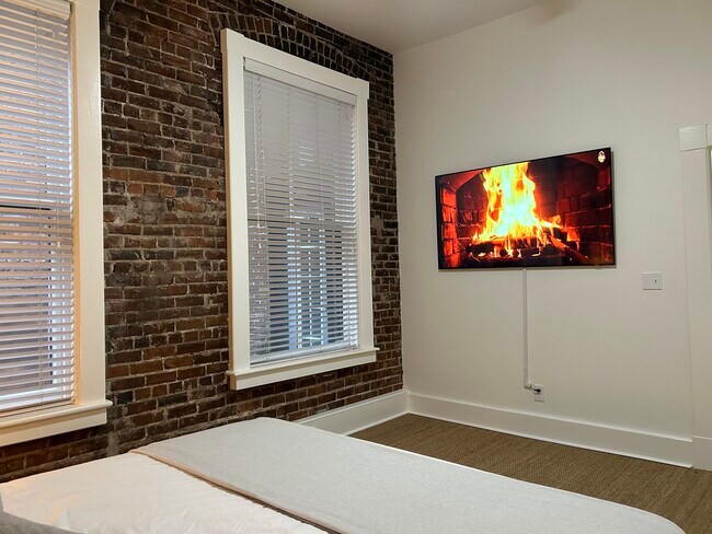 65in TV in bedroom. - 20 W Oglethorpe Ave