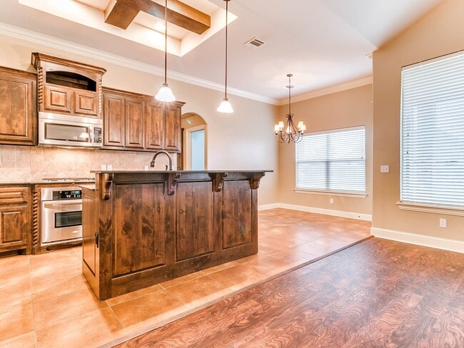 Building Photo - 4 Bedrooms/3Car/Edmond Schools -  Community Pool- Storm Shelter