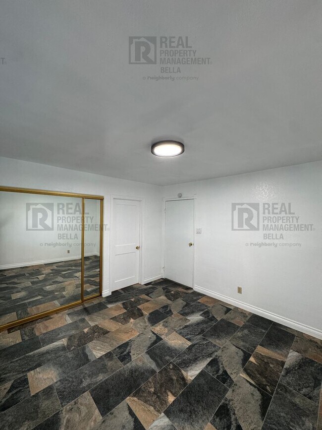 Building Photo - Peaceful Nuevo Living with Gated Driveway, Spacious Layout and Outdoor Living