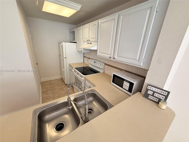 Building Photo - 1845 Palm Cove Blvd