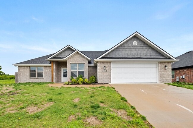 Primary Photo - Spacious 4-Bedroom Home with Open Layout, ...