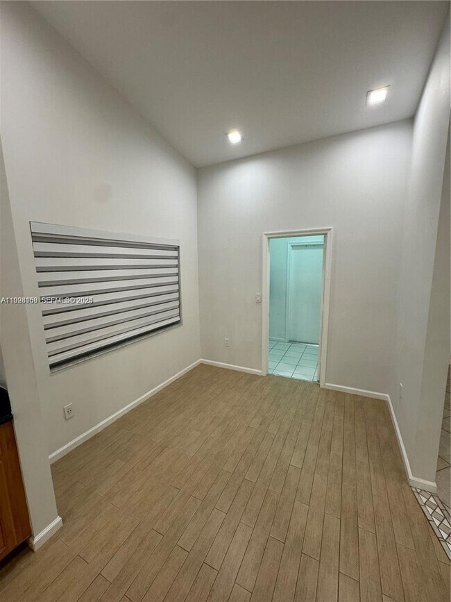 Building Photo - 8965 SW 59th Ct