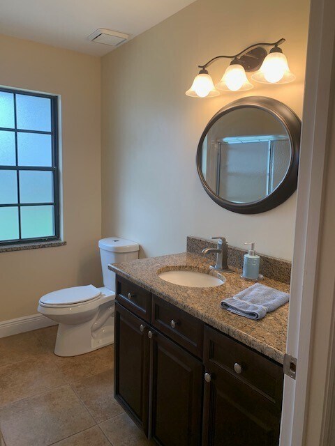 Building Photo - Stunning Pelican Bay Townhome