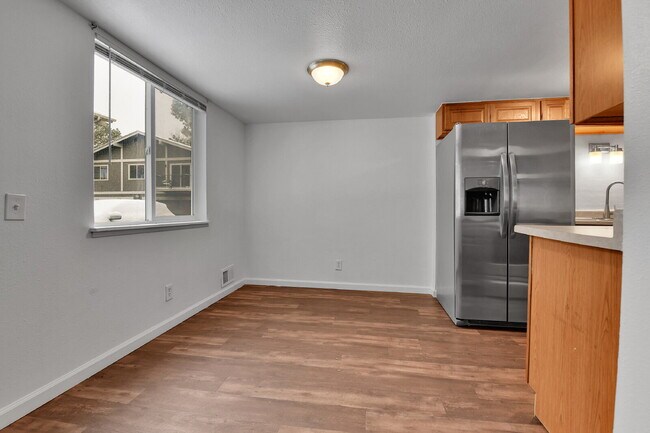 Building Photo - $1,540.95.95- 2 Bed, 1 Bath Condo in Aurora with Central AC and in Unit Laundry!