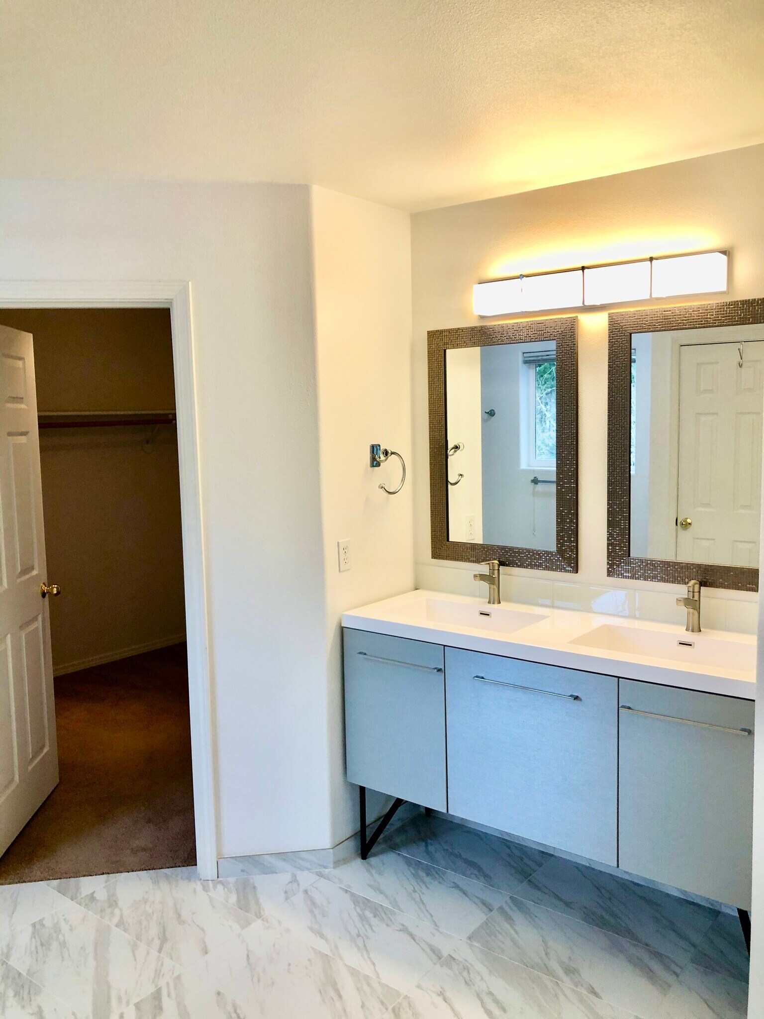 Primary with walk-in closet size of a bedroom - 1552 SE Ripplewood Ave