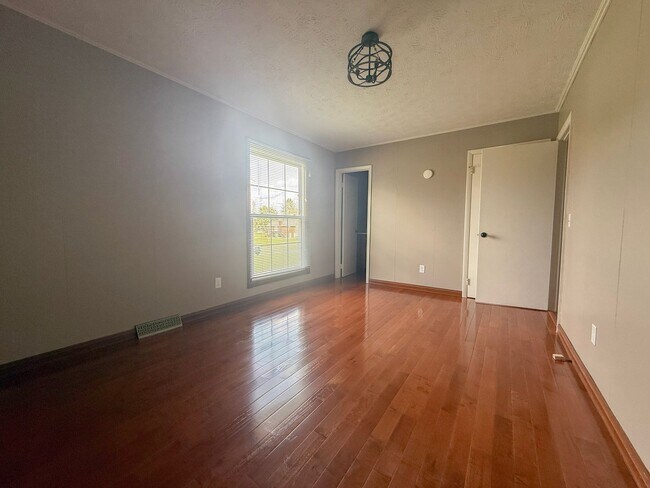 Building Photo - Spacious 3-Bedroom Home with Huge Yard, Covered Porches & Storage Building