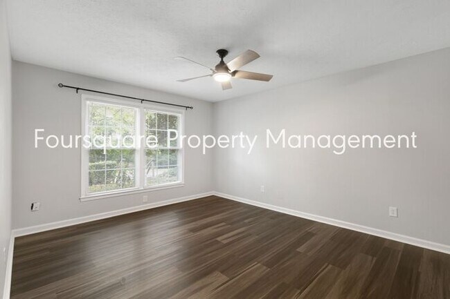 Building Photo - Charming 1st-Floor End-Unit Condo with Gas Log Fireplace, Private Back Porch & Community Pool – T...