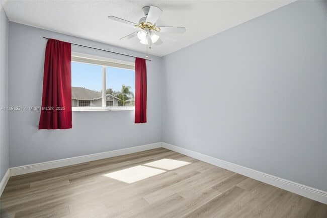 Building Photo - 12153 SW 49th Ct