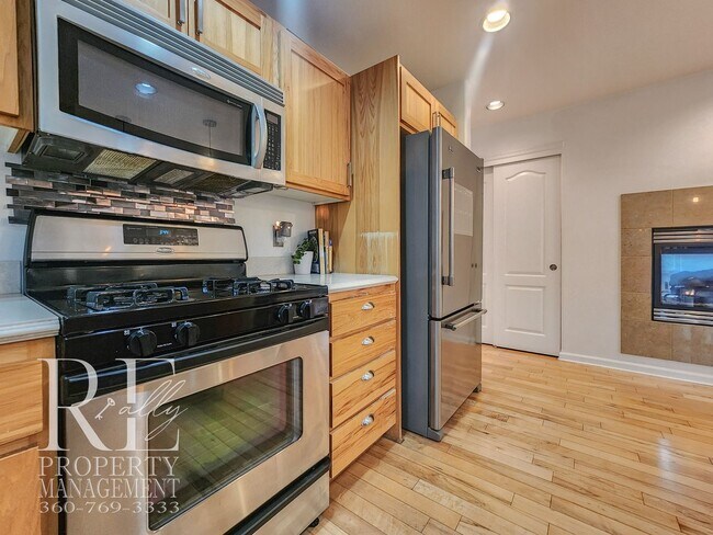 Building Photo - Light-Filled View Home with Vaulted Ceilings & Warm Wood Finishes