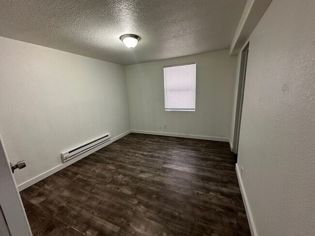 Building Photo - Spacious 4 Bedroom Home | 2 Living Rooms | Large Fenced Yard | 1,700+ Sq Ft