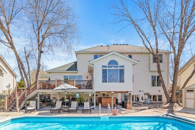 Building Photo - Luxury 4-Bed Retreat with In-Ground Pool & 3-Car Garage