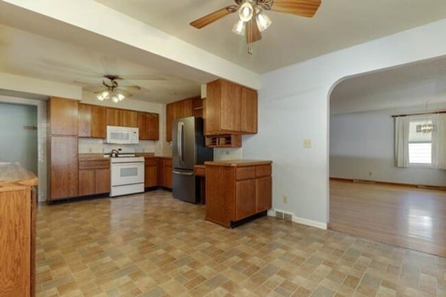 Building Photo - Spacious 3-Bedroom Home with Oversized Gar...