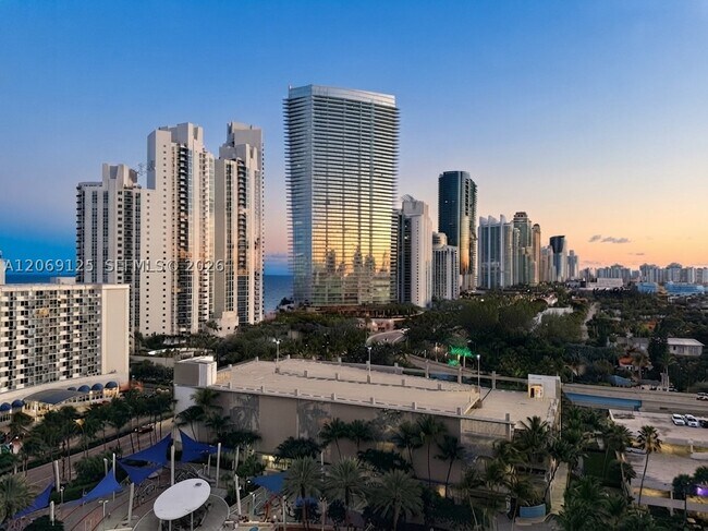 Building Photo - 19370 Collins Ave