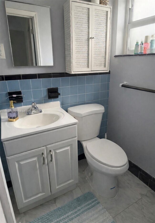 Building Photo - 6497 W 8th Ln